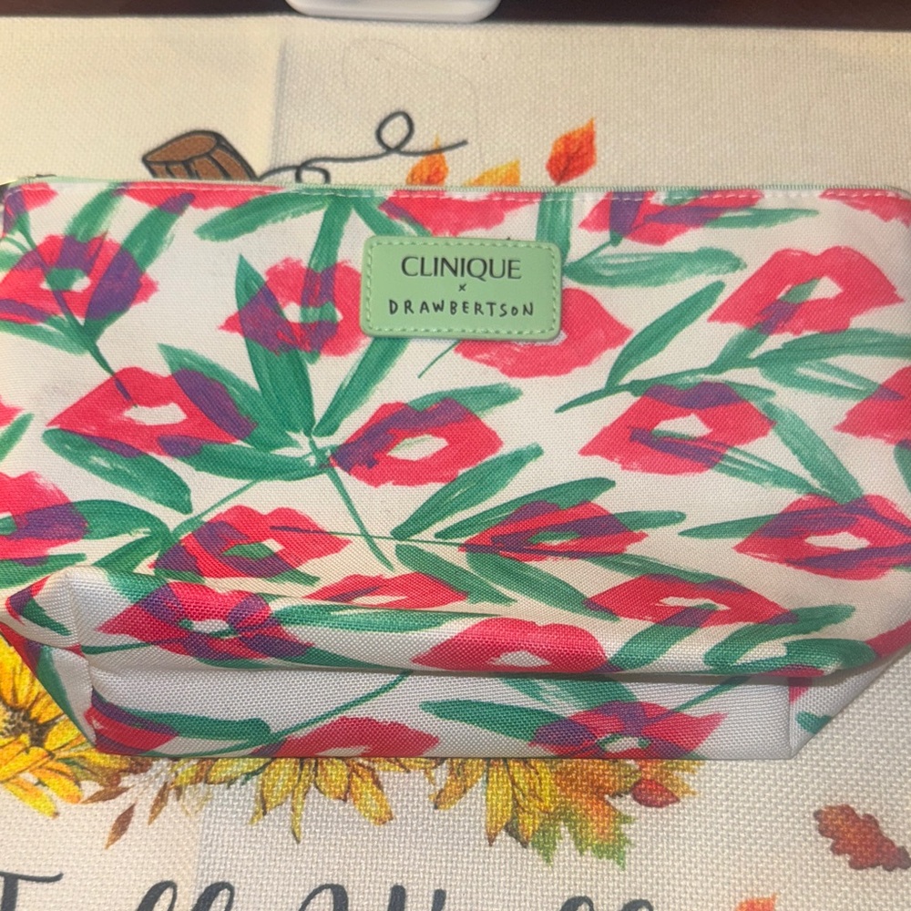 Clinique Cosmetic Bag with Red Lips and Green Floral Design